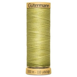 A spool of Gütermann green sewing thread, measuring 100 meters (110 yards). The thread is neatly wound on a yellow spool with labeled ends.