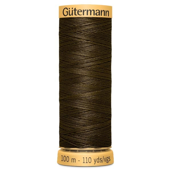 A spool of Gütermann sewing thread in dark brown is upright against a white background. The label indicates 100 meters or 110 yards of thread.