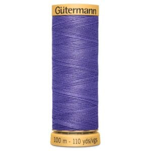 A spool of Gütermann thread with purple yarn. The spool displays "100 m - 110 yds/vgs" at the bottom, indicating the length of the thread.