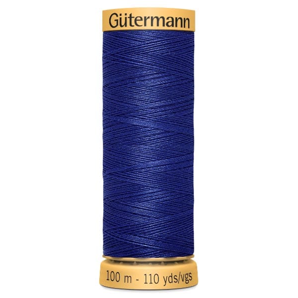 Spool of Gütermann dark blue sewing thread, labeled 100 meters (110 yards), is shown against a plain white background.