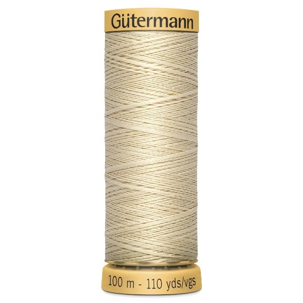 Spool of Gutermann thread, 100 meters or 110 yards, in light beige.