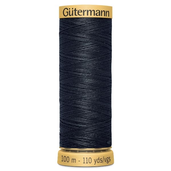 A spool of Gütermann thread, dark blue in color, wrapped neatly around a yellow cylindrical holder. The holder has "Gütermann" written on the top and "100 m - 110 yds/vgs" on the bottom.