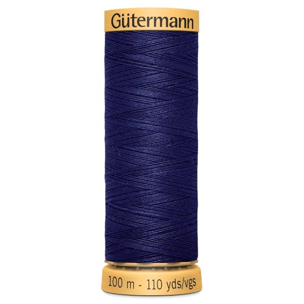 Spool of Gütermann thread in dark blue, labeled for 100 meters or 110 yards.