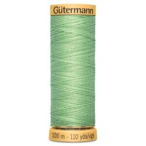 A spool of Gütermann sewing thread in mint green. The spool's label indicates it contains 100 meters or 110 yards of thread.