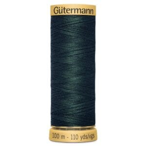 A spool of Gütermann sewing thread in deep green. The spool is labeled with "100 m - 110 yds." The thread is tightly wound around a beige spool with the brand name on top.