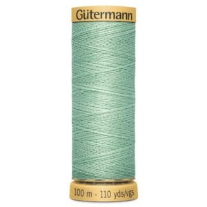 Spool of Gütermann thread in light green, labeled with "100 m - 110 yds" on the base.