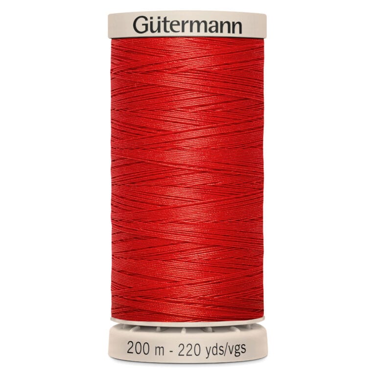 A spool of Gütermann thread in bright red color. The label indicates it is 200 meters or 220 yards long.