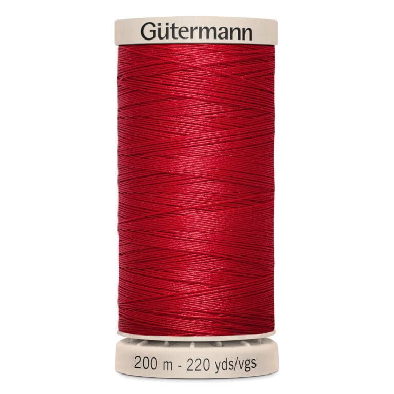 A spool of Gütermann thread in vibrant red. The spool is marked with "200 m - 220 yds/vgs" and features a beige top and bottom. The thread is neatly wound around the spool.