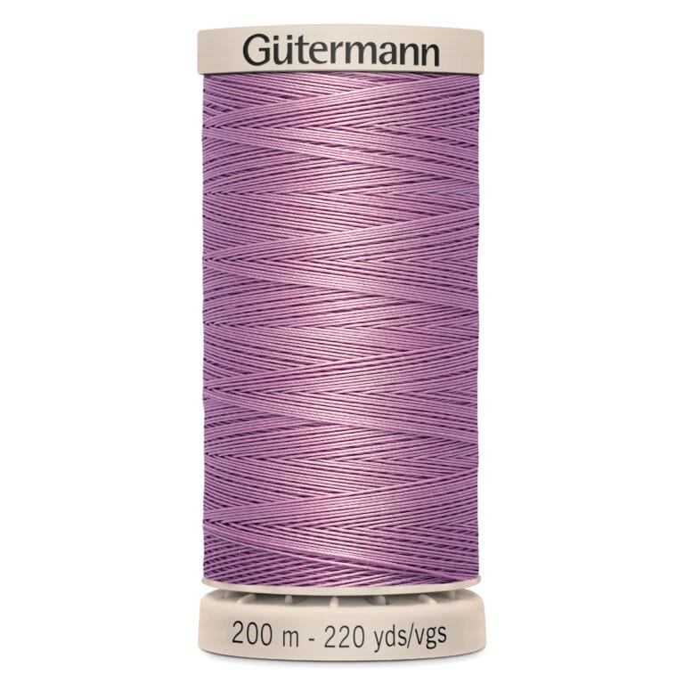 A spool of Gütermann thread in a shiny lavender color. The spool is labeled with 200 meters and 220 yards along the bottom edge against a white background.