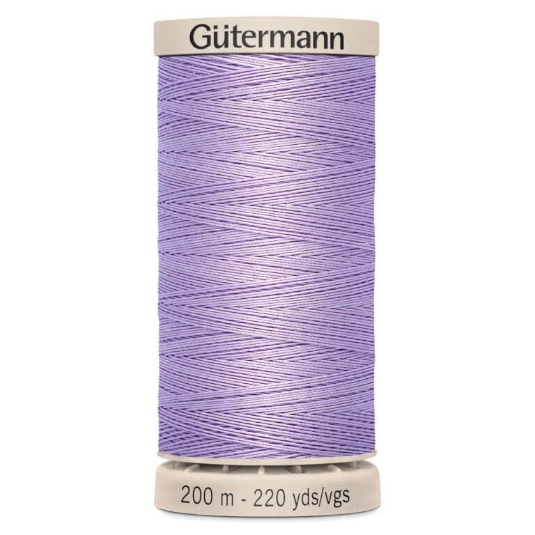 A spool of Gütermann sewing thread in a lavender color. The spool displays the brand name "Gütermann" on top and indicates a length of 200 meters or 220 yards.