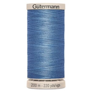 A spool of Gütermann sewing thread in blue. The label indicates the length as 200 meters or 220 yards.