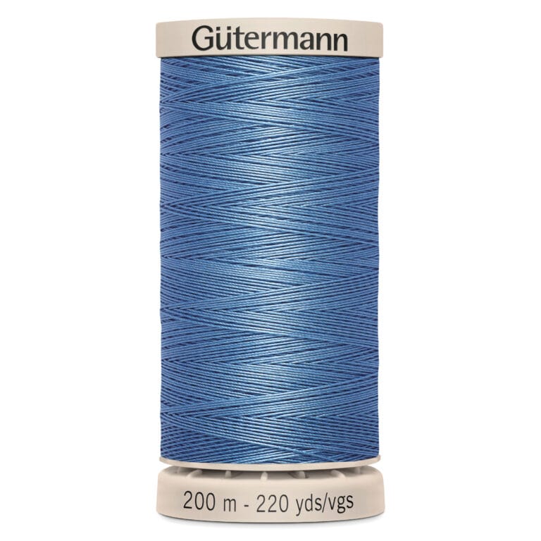 A spool of Gütermann sewing thread in blue. The label indicates the length as 200 meters or 220 yards.