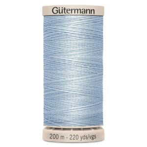 A spool of light blue Gütermann sewing thread, labeled with a length of 200 meters or 220 yards. The spool is white with coordinating cap and base.