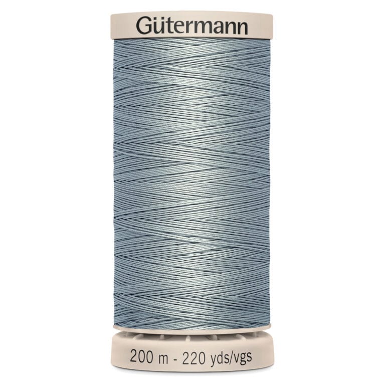 A spool of Gütermann sewing thread, pale blue in color, labeled with a length of 200 meters or 220 yards. The spool is set against a plain white background.