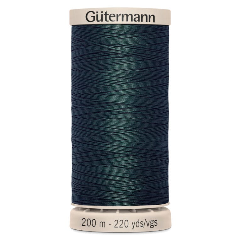 A spool of Gütermann thread in dark teal, measuring 200 meters or 220 yards. The label "Gütermann" is printed on the top, and the length is noted at the bottom. The thread is neatly wound around a beige plastic spool.