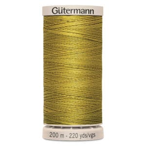 Spool of Gütermann thread with 200 meters/220 yards of golden-yellow thread. The spool is beige and labeled at the top and bottom.