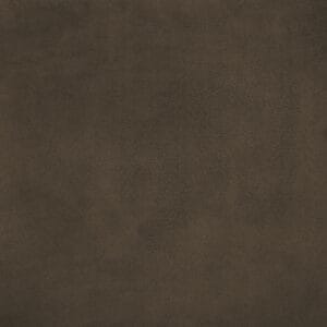 A close-up of a soft, dark brown suede texture, showing a smooth, slightly mottled surface with subtle variations in shading.