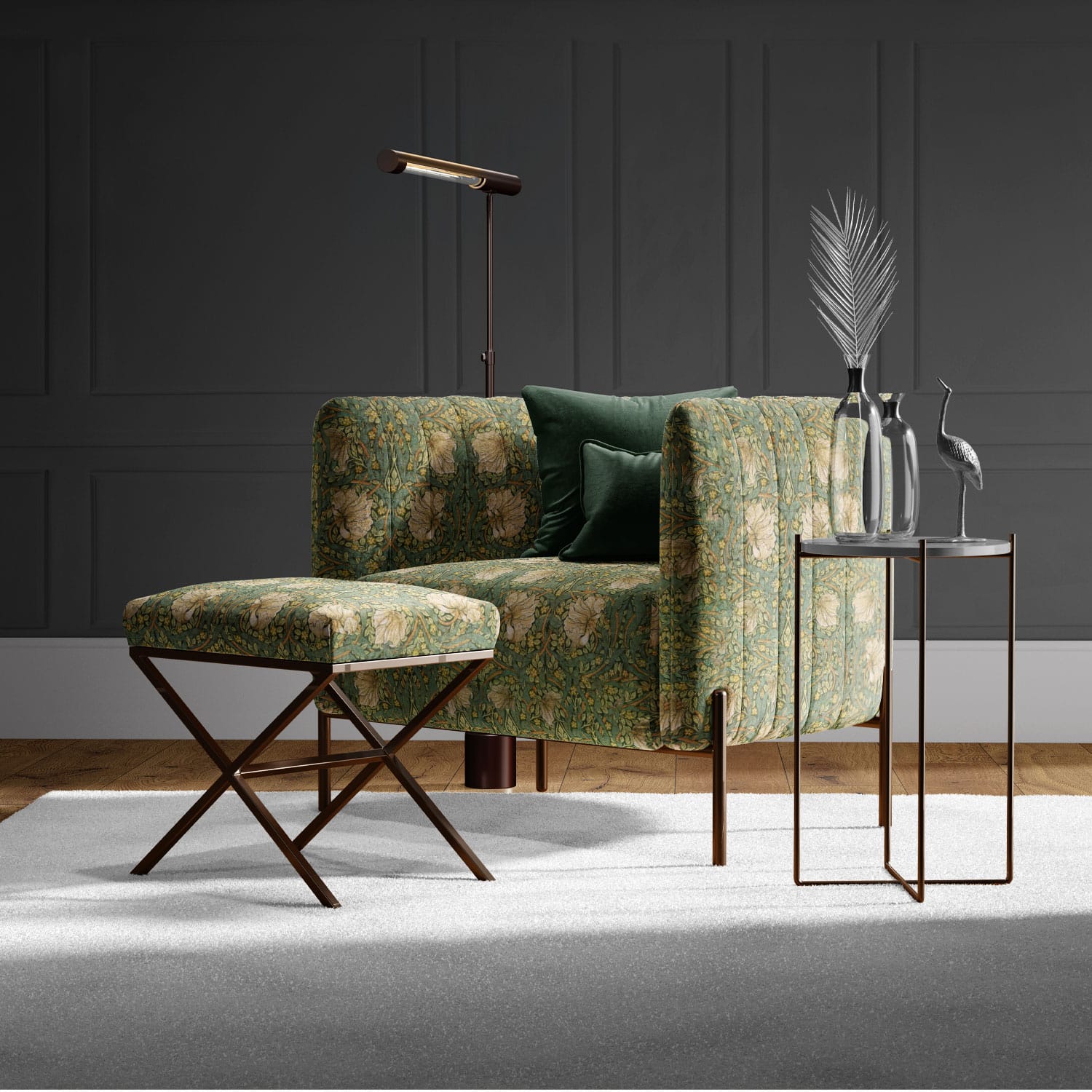 A stylish living room showcases a patterned green armchair and ottoman made with William Morris | Pimpernel | Tapestry Fabric, exuding timeless elegance. A modern floor lamp stands next to a small table of decorative items against a dark grey paneled wall, enhancing the light rug's sophistication.