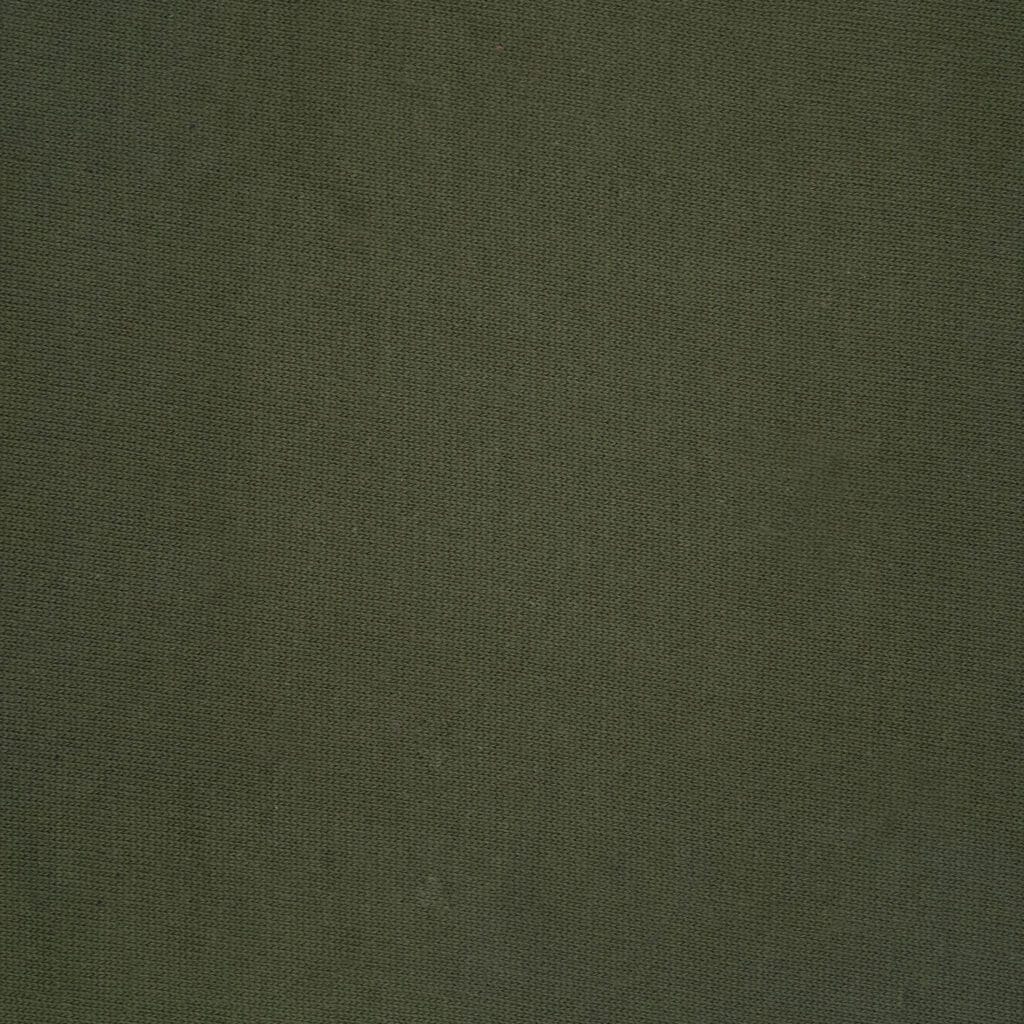 Close-up of a plain, textured fabric in a solid olive green color. The surface appears slightly rough, suggesting a woven material with visible small fibers.