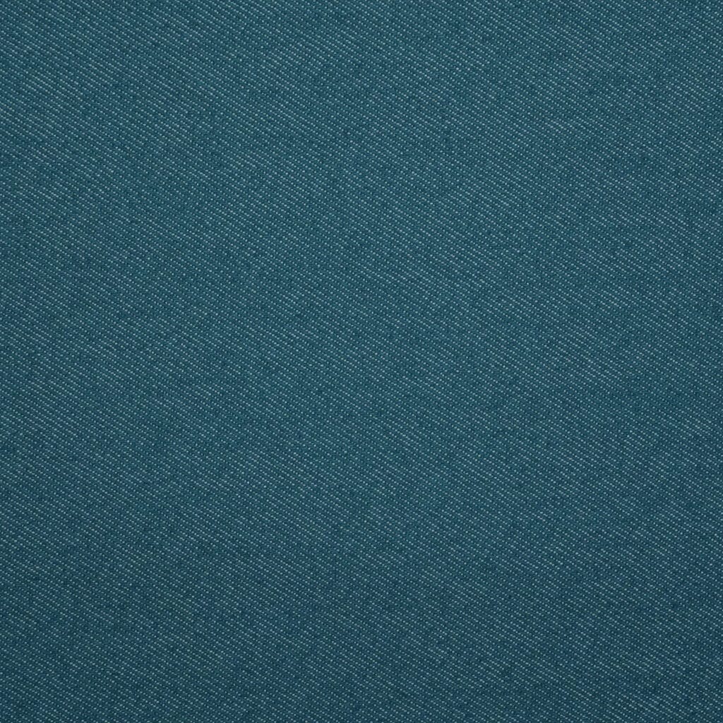 Close-up of teal denim fabric with a diagonal weave pattern. The texture shows fine lines and stitching typical of denim material, creating a subtle, textured appearance.