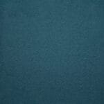 Close-up of textured blue-green fabric with a subtle diagonal weave pattern, giving it a soft and slightly heathered appearance.