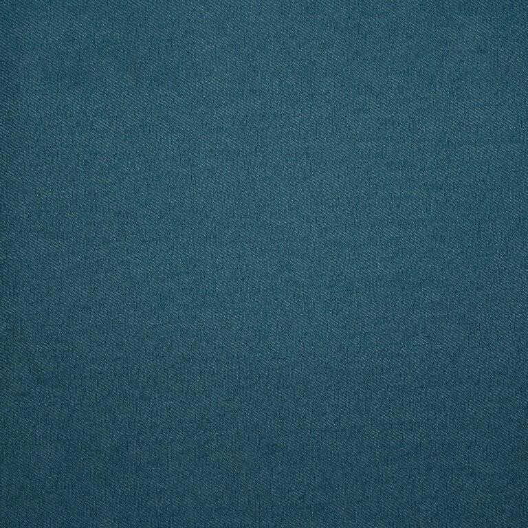 Close-up of textured blue-green fabric with a subtle diagonal weave pattern, giving it a soft and slightly heathered appearance.