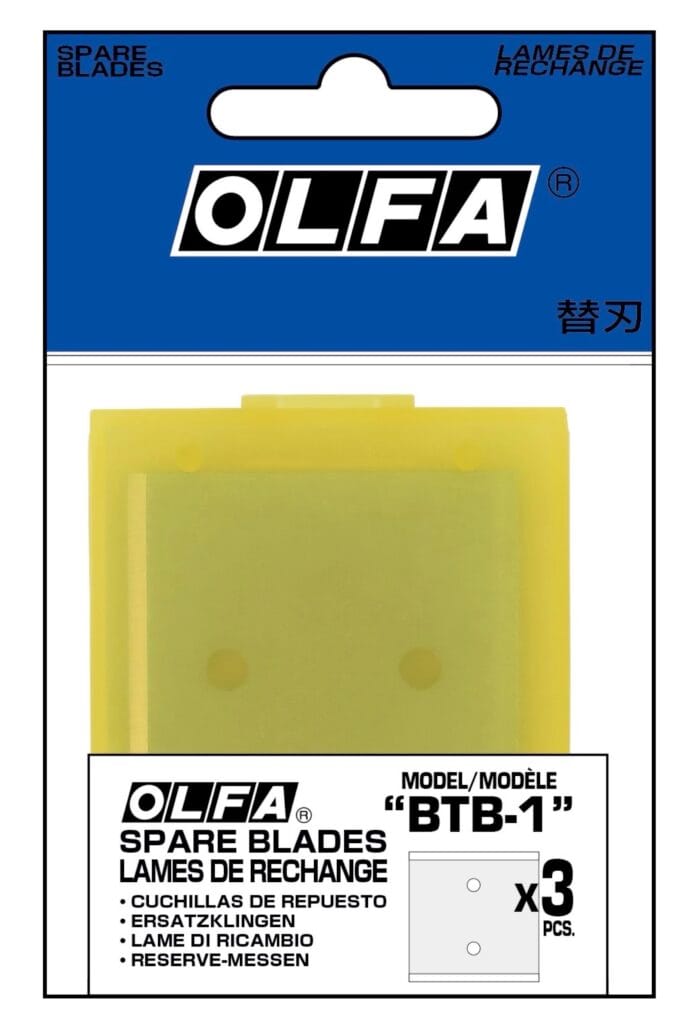 A retail package of OLFA spare blades, model BTB-1, containing three replacement blades in a yellow case. The packaging includes text in multiple languages and features the OLFA logo at the top.