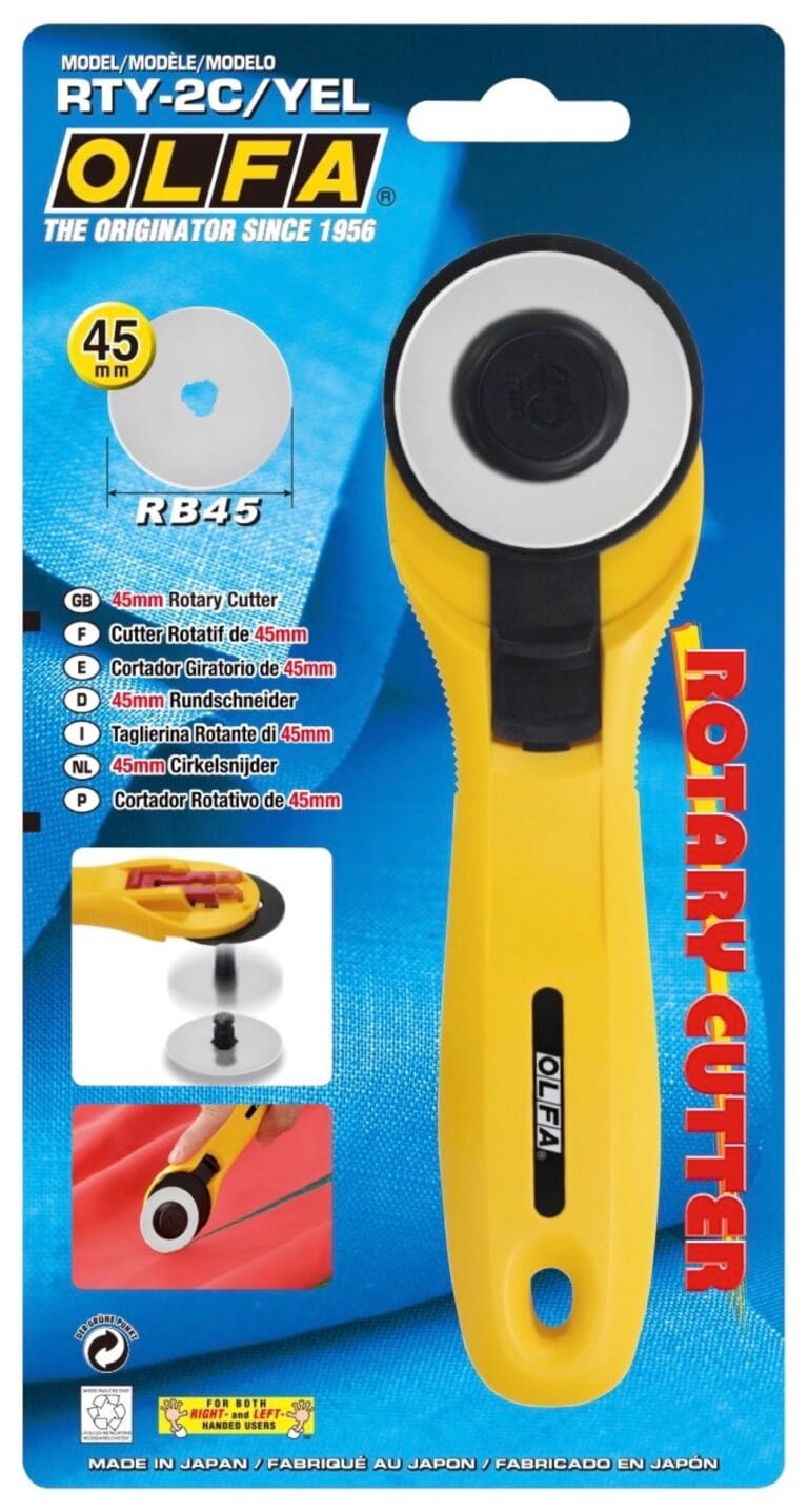 A yellow OLFA RTY-2C/YEL 45 mm rotary cutter in packaging, with product details, features, and images of the cutter in use on a blue background. The package highlights “ROTARY CUTTER” in red text on the right.