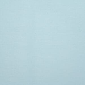 A close-up view of a light blue textured fabric with a subtle woven pattern and no visible objects or distinct features.