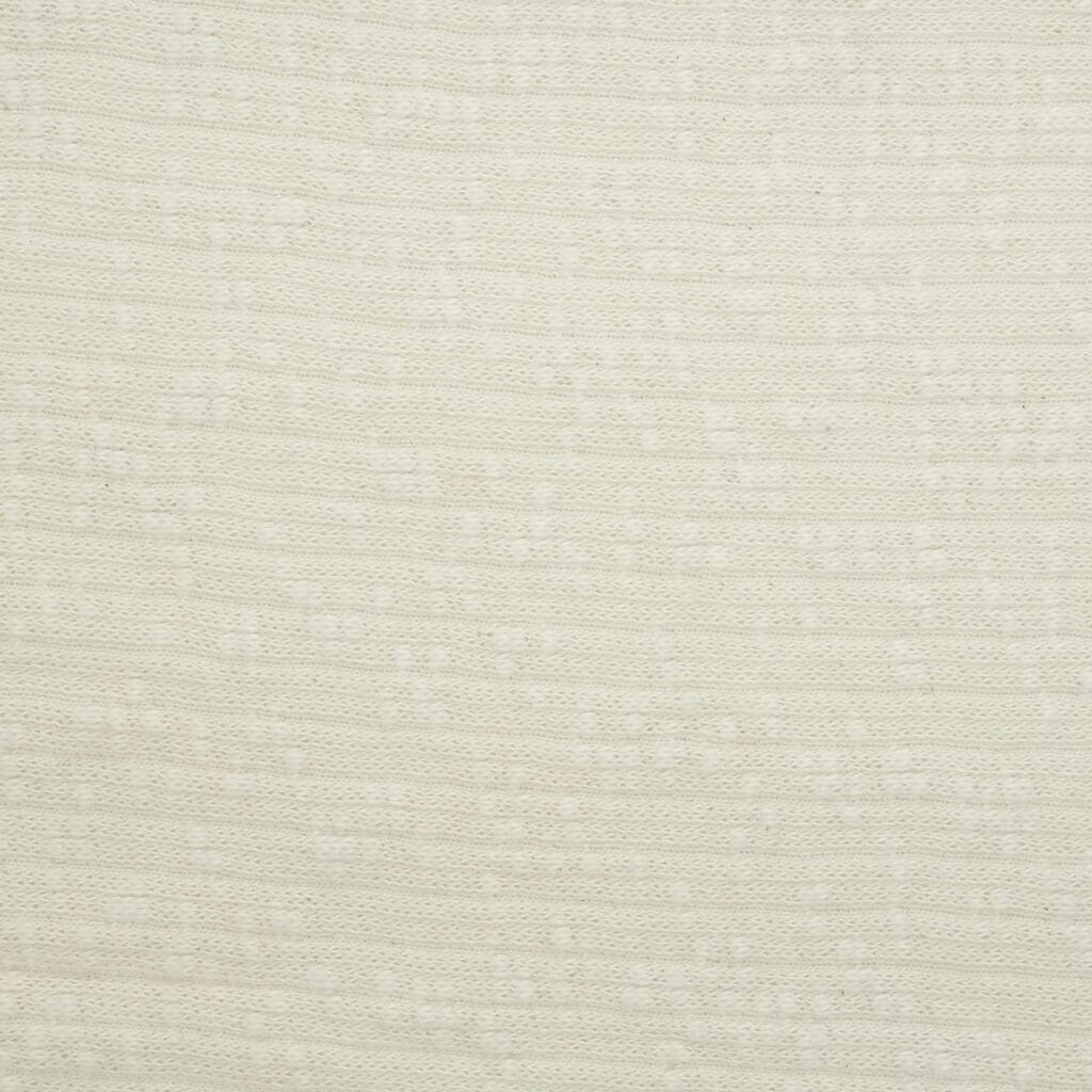Close-up of a light beige, textured fabric with a subtle, horizontal stripe pattern. The material appears soft and evenly woven, with small, slightly raised dots and lines creating a gentle, repetitive design.