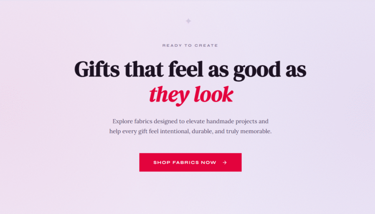 Centered text on a pink gradient background reads: "Gifts that feel as good as they look." Below is text about handmade fabrics, and a pink button labeled "Shop Fabrics Now" with a right arrow.