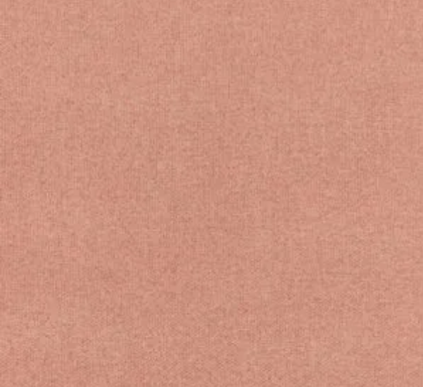 A close-up view of a soft, plain, dusty pink fabric texture with a smooth and even surface.
