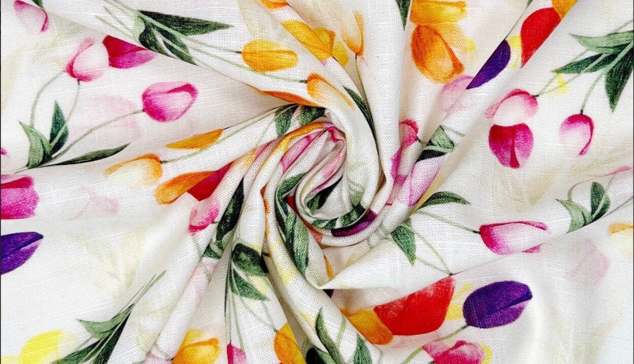 Viscose fabric draped elegantly — fluid, soft spring dressmaking fabric