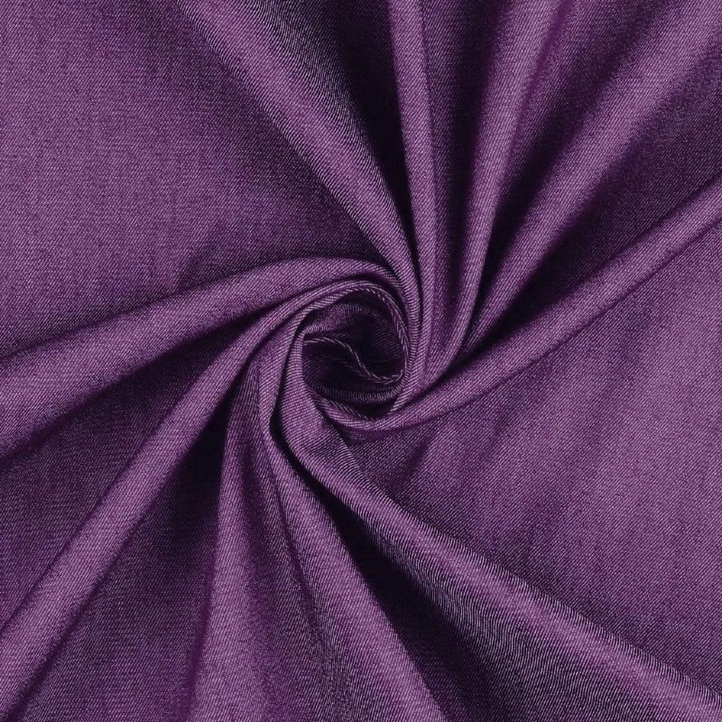 Close-up of coloured denim fabric texture