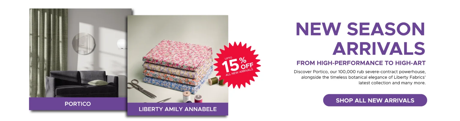 Promotional banner for new fabric arrivals featuring Discount Fabrics. Showcases curtains labeled "Portico" and stacked floral fabrics labeled "Liberty Amily Annabelle," plus a "15% off all new arrivals" badge. Button: "Shop all new arrivals.