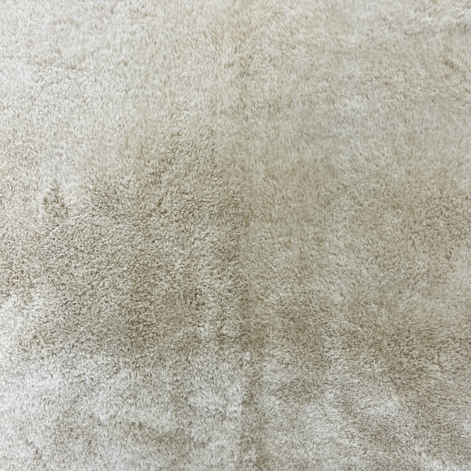Plush faux fur fabric for a detachable coat collar